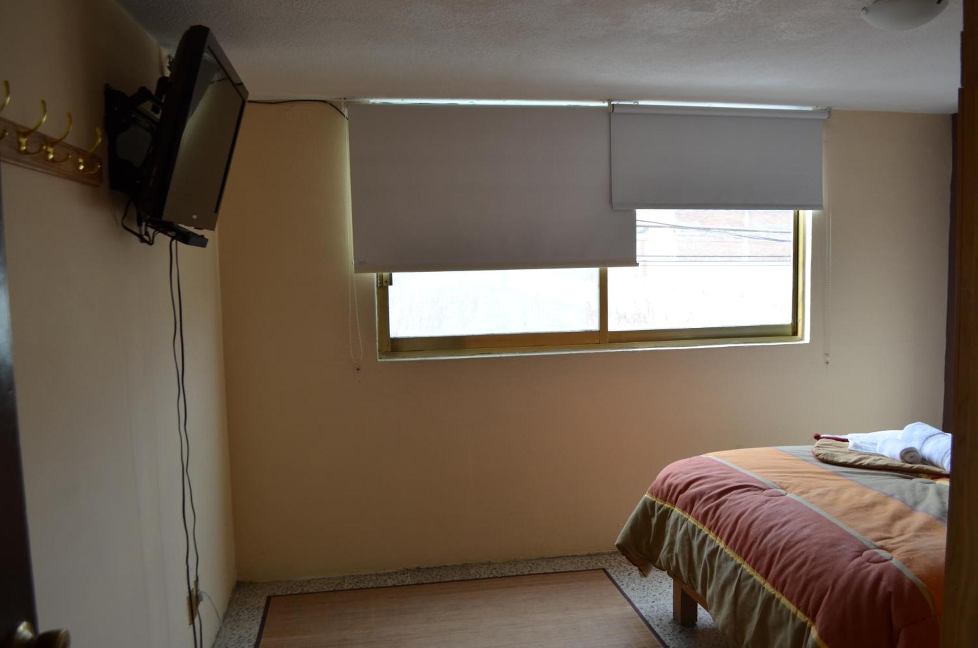 Hotel Tolotzin Толука-де-Лердо Номер фото